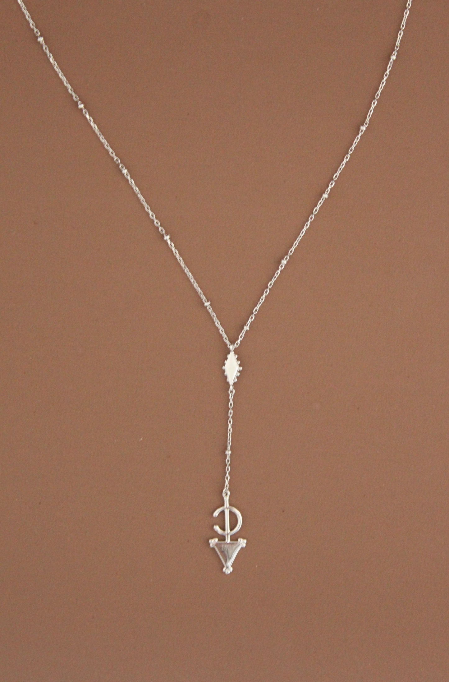 Platinum Plated Fibula Drop Necklace ©