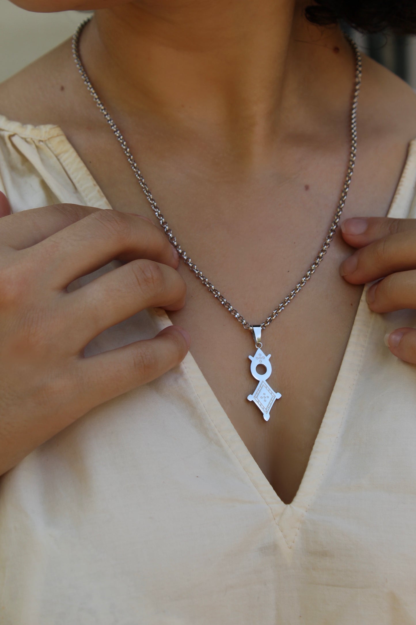 Unisex Rhodium Plated Agadez Symbol Necklace ©