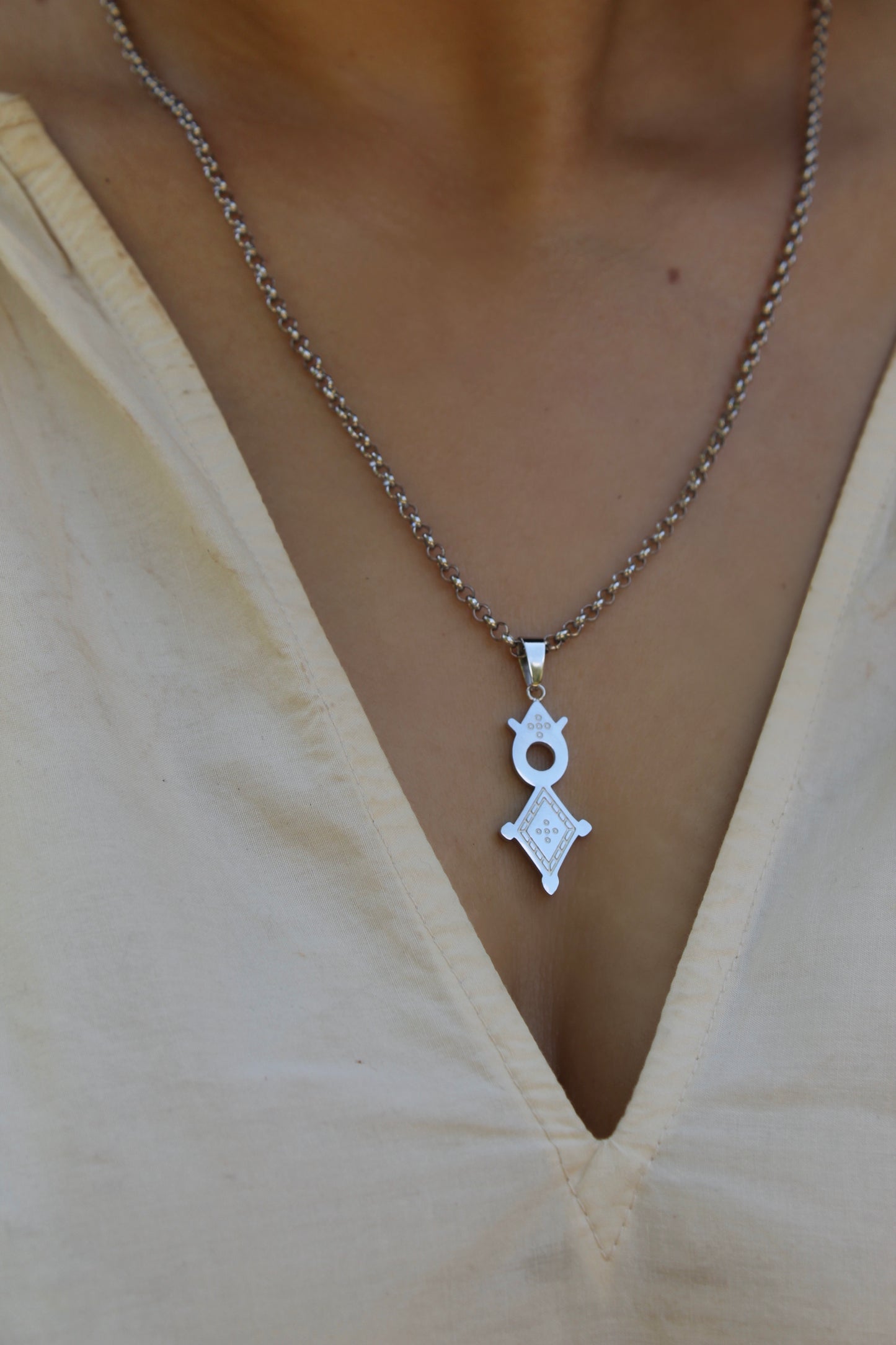 Unisex Rhodium Plated Agadez Symbol Necklace ©