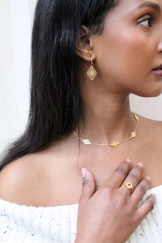 Lion's Paw Symbol Hoop Earrings ©