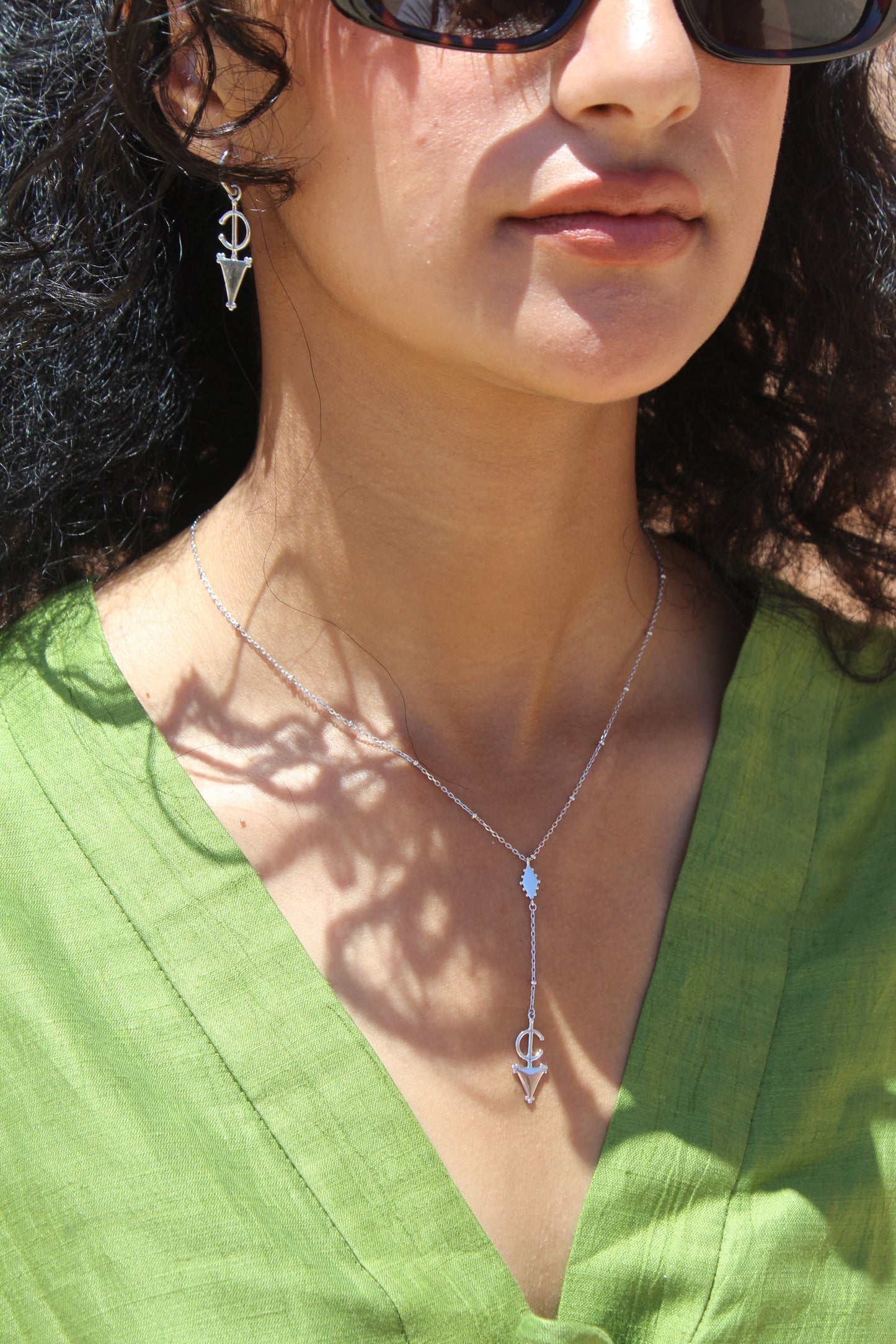 Platinum Plated Fibula Drop Necklace ©